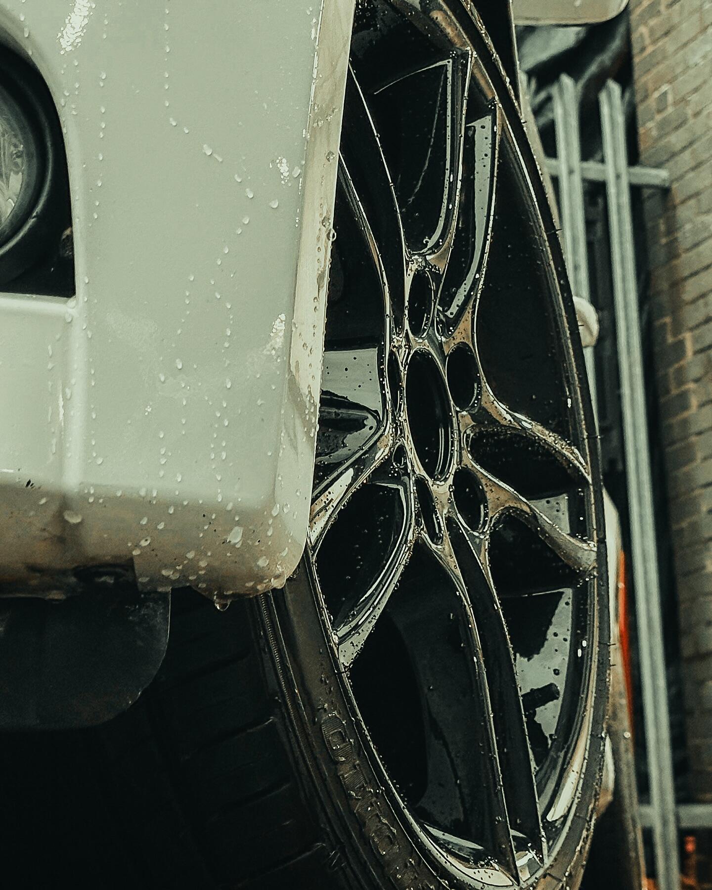 Custom gloss black alloy wheel fitted on vehicle