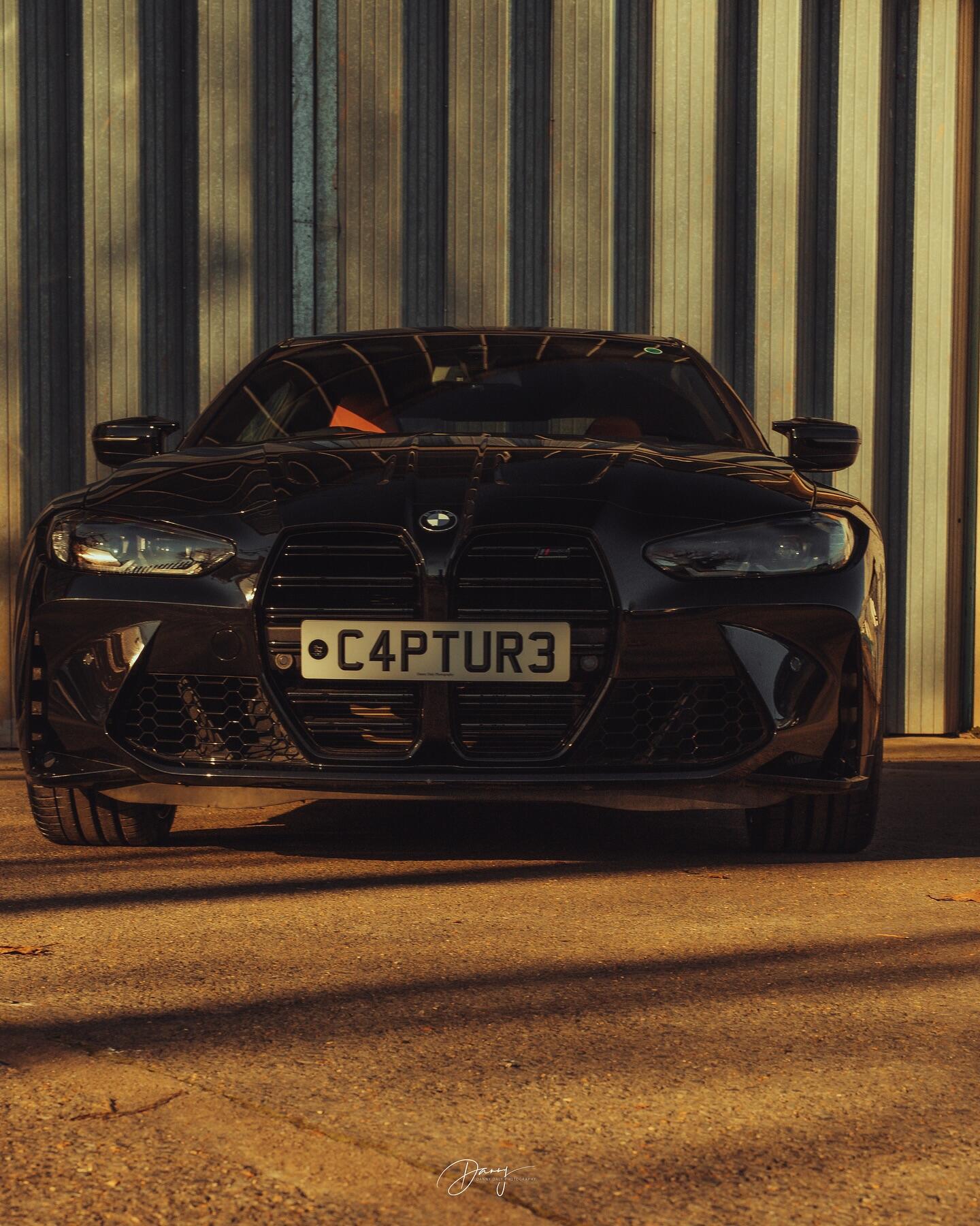 BMW M4 front view with refurbished alloy wheels