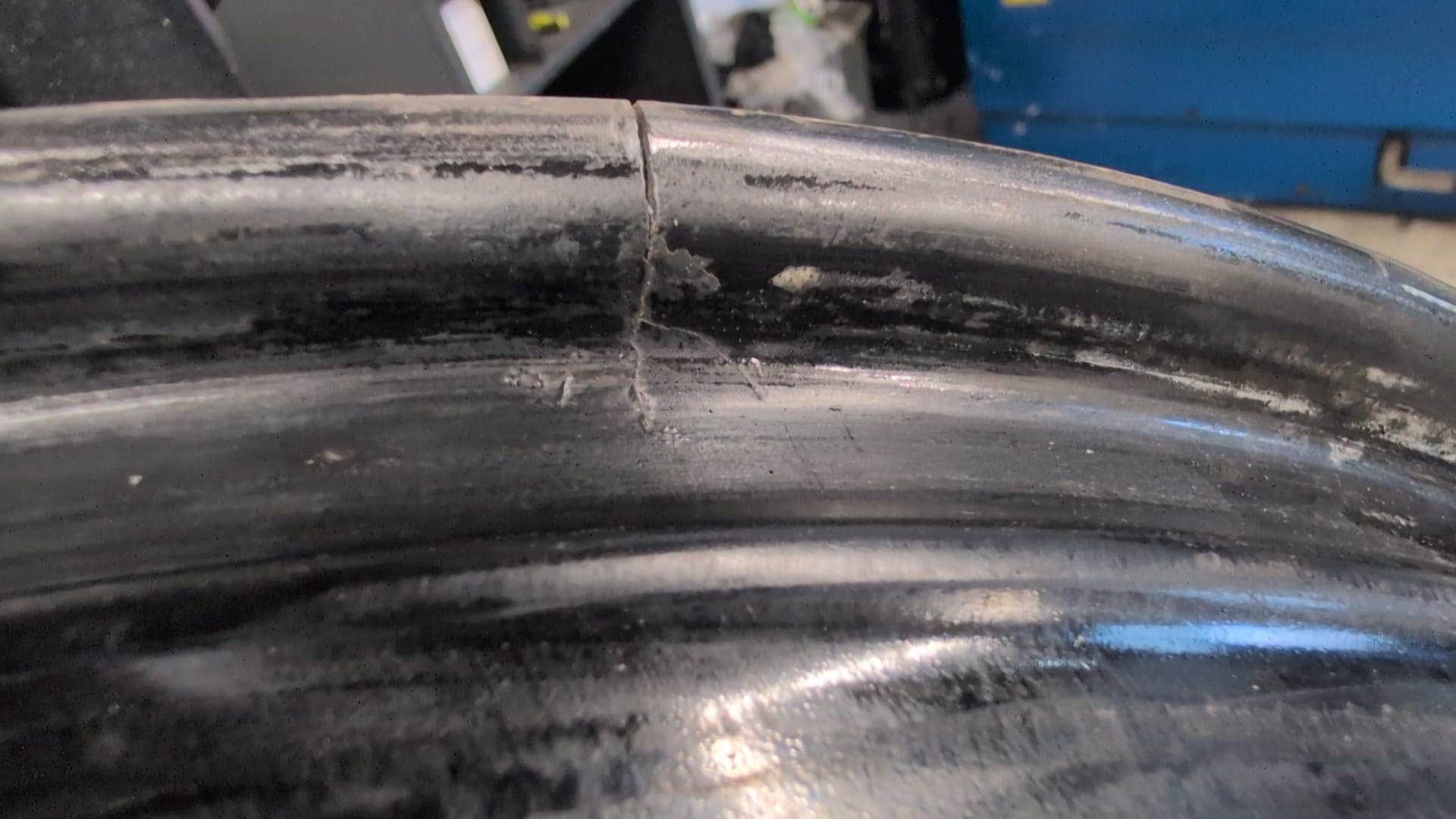 Damaged alloy wheel requiring professional cosmetic repair