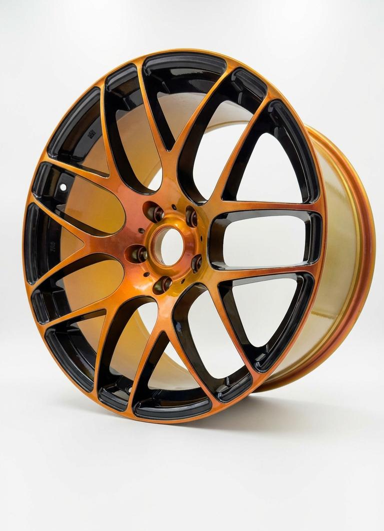 Custom bronze finish on Porsche alloy wheel by South West Alloys