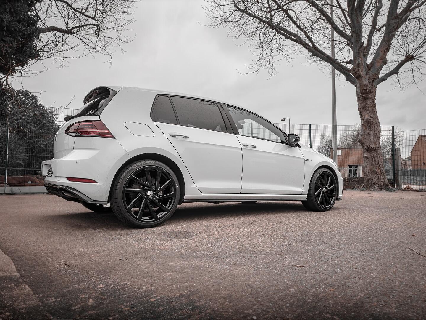 VW Golf with custom gloss black alloy wheel finish — South West Alloys custom colour change service Exeter