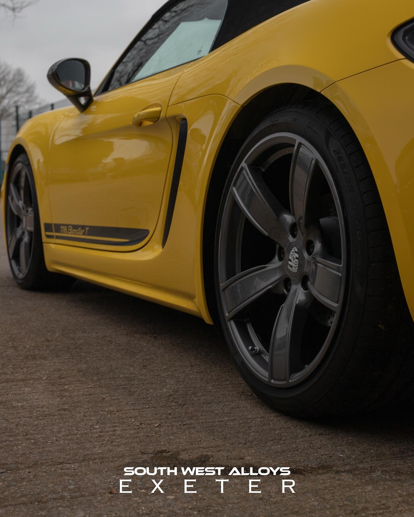 Yellow Porsche Boxster with refurbished alloy wheels
