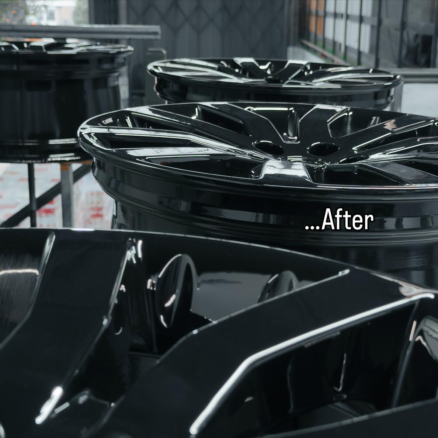 Set of alloy wheels after professional refurbishment — showroom finish